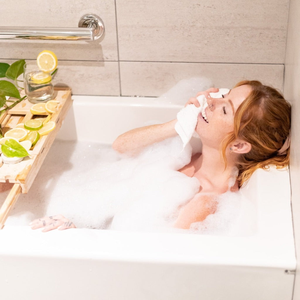 Woman enjoying a luxurious and nourishing bubble bath that&
