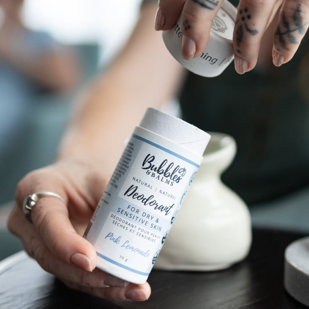Bubbles & Balms natural Pink Lemonade deodorant with cap pulled off of zero-waste tube.