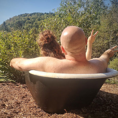 Bubbles & Balms Cofounders Judith & Justin Sweeney in Garden Tub Near Production Studio in Hampton, New Brunswick, Canada