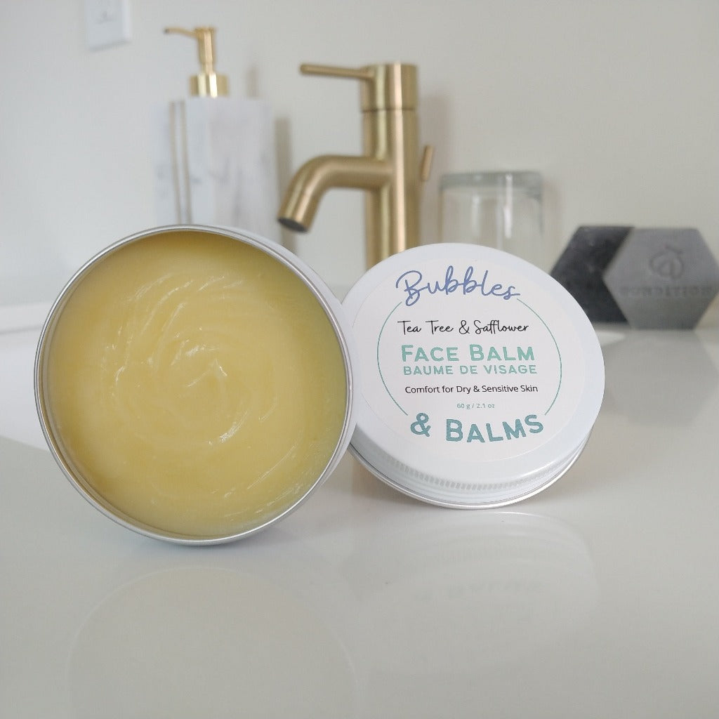 Tea Tree &amp; Safflower Face Balm open and showing the rich, nourishing texture of this oil-based night cream.