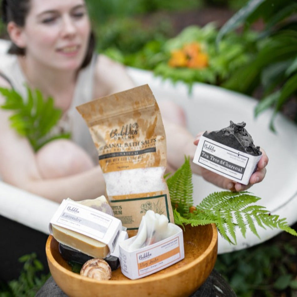 Bubbles &amp; Balms Tea Tree &amp; Charcoal Natural Bar Soap for Oily &amp; Acne-Prone Skin Being Selected from Bowl near Garden Tub