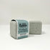 Bubbles & Balms Cedar & Lemongrass Fizzy Bath Bomb with label and nude